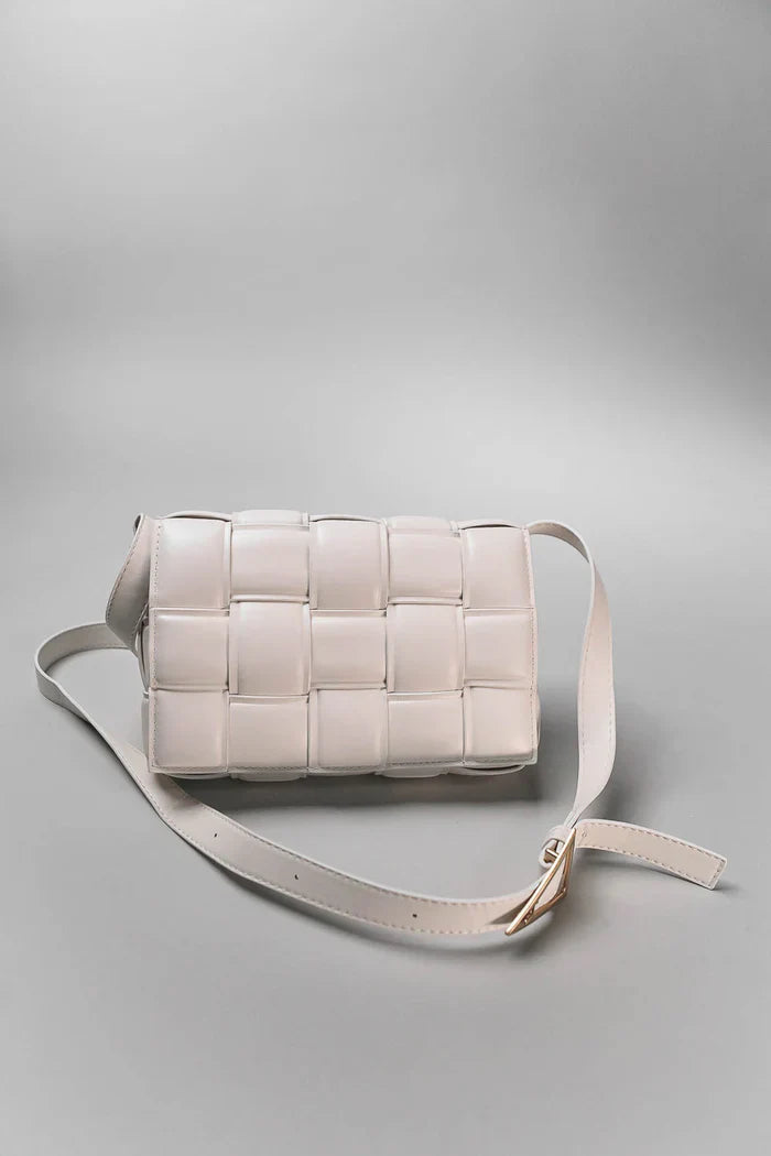 Geometrical bag with shoulder strap